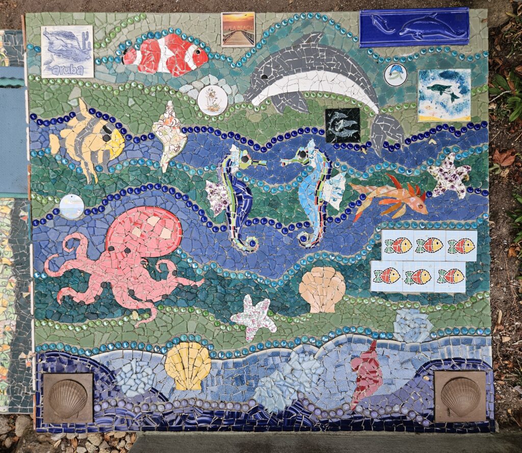 4 ft x 4 ft mosaic step with octopus, seahorses, dolphins, fish, starfish, and seashells